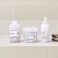 Davines LOVE Smoothing Shampoo with the LOVE Smoothing range on a bathroom shelf
